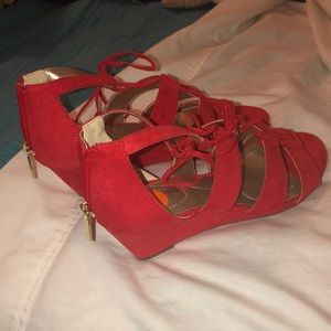 Red strappy low-wedge heels